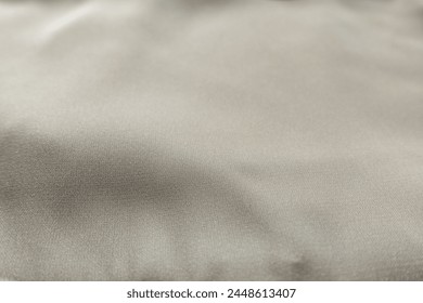 Close view of simple light beige rayon fabric