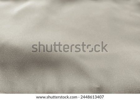Close view of simple light beige rayon fabric