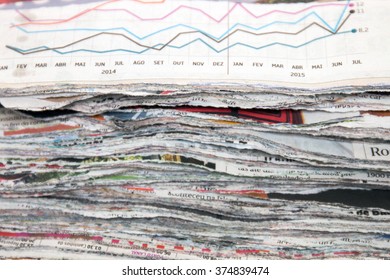 Close view of a slice (cut) pile of used newspapers. 