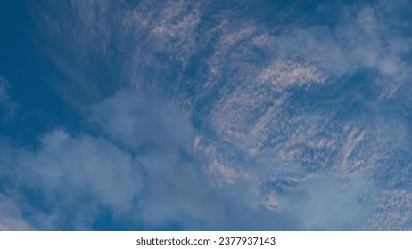 Close view of small clouds, during the evening.  The weather is calm and stable
