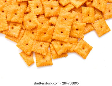 A Close View Of Small Square Cheese Crackers.