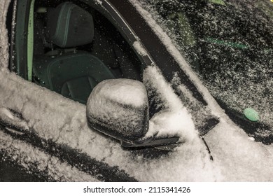 Close Up View Of Snowy Side Door Of Parked Car Night. Sweden. 