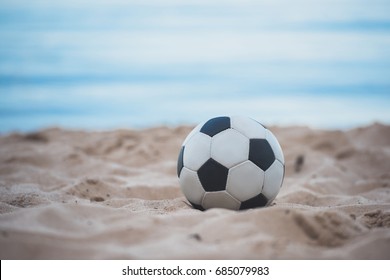 Close Up View Of Soccer Ball On Summer Sandy Beach