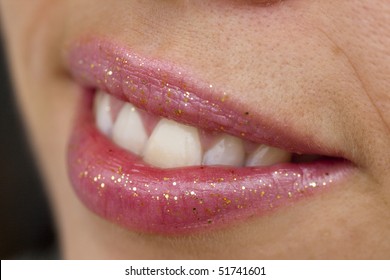 Close up view of some pink lips smiling. - Shutterstock ID 51741601