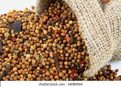 Close Up View Of Spilled From Burlap Sack Pickling Spice, Which Is Mixed From Different Herbs Spice Used For Pickling Food.