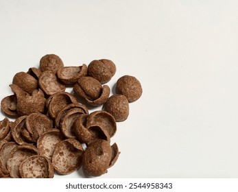 Close up view of a stack of chocolate cereal isolated on a white background, Koko Krunch cereal for kids