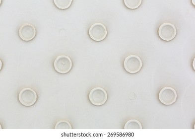 A Close View Of The Suction Cups On The Back Of A Rubber Bath Mat.