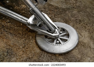 Close up view of the support of a metal lander on the surface of the Moon or planet Mars, the concept of space exploration and colonization, the landing of a spacecraft