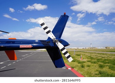 A Close Up View of the Tail Boom and Rotor on a Helicopter