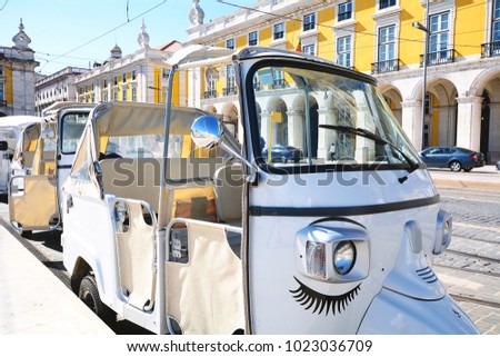 Close up view of tuk tuk on street of Lisbon in Portugal.