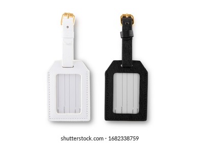 A Close View Of Two Pairs Of White And Black Leather Name Tags For Luggage Isolated On A White Background.