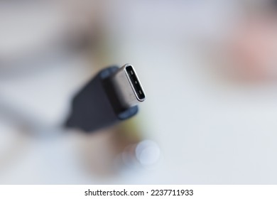 Close up view of USB C type connector with shallow depth of field.