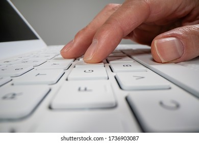 Close up view of using laptop computer