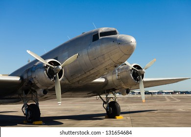 Close up view of a vintage propeller passenger and cargo airplane.