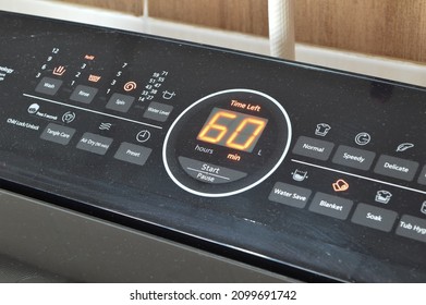 Close up view of washing machine digital control panel