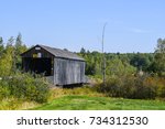 Close up view of the weathered wood of the Hoyt Station Covered Bridge in New Brunswick, Canada