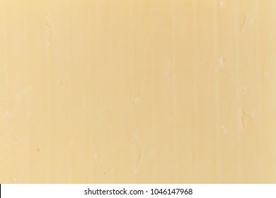 Close View White Sharp Cheddar Cheese Slices.