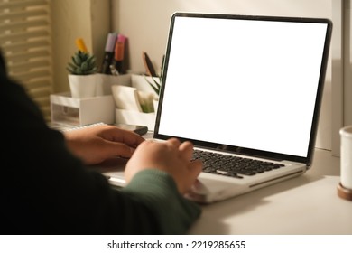 Close Up View Of Woman Hands Typing On Laptop Computer. Blank Screen For Your Advertise Design.