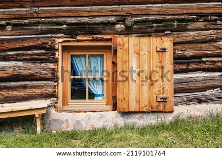 close views of wooden mountain cabins inside Val San Nicolò, Pozza di Fassa, Dolomites, Italy