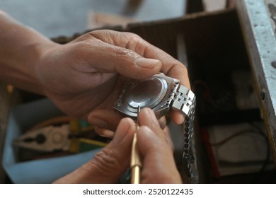 close up of vintage automatic watch repairing              
                              - Powered by Shutterstock