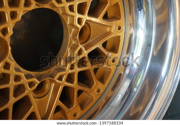 Close up vintage car\
wheels of a spots car