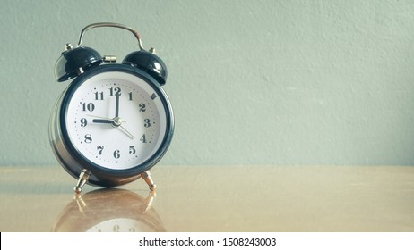 Close up Vintage clock in pastel tone.
