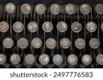 Close up vintage dusty old manual typewriter keys. Antique typewriter keys