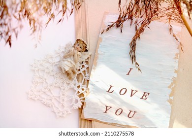 Close Up Of Vintage Note Pad And Handmade Greeting Cardwith I Love You Text , Dry Autumn Flower. Top View. Lifestyle And Love Concept, Boho Style Aesthetics