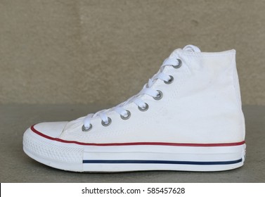 close up vintage style of sport white sneaker shoe on white background