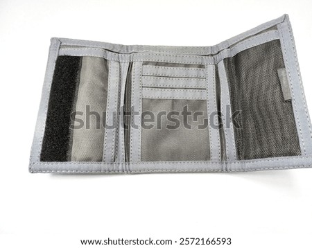 close up of a wallet made of polyester material on a white background