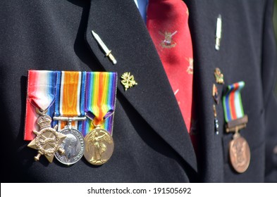 Close Up Of War Medals On New Zealander Military Veteran  Soldier  Of New Zealand Army During A National War Memorial Anzac Day Service In New Zealand. No People. Copy Space