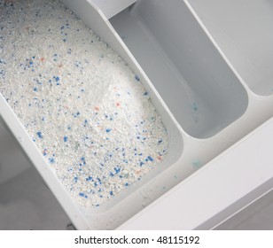 Close Up Of Washing Powder In Washing Machine