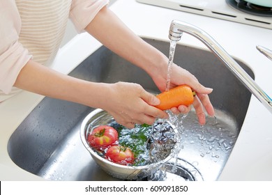 close up of washing the vegetables - Powered by Shutterstock