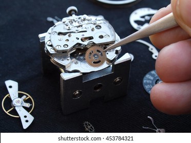 close up of watchmaker desktop assembling  A vintage Mechanical Watch  - Powered by Shutterstock