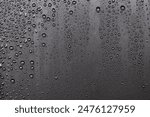 Close up of water droplets on dark cover background. Water droplets concept.