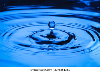 Close Water Drops Falling Into Water Stock Photo 2198551381 