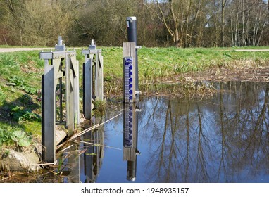 Close Up Of A Water Level Meter With The Dutch Text: Water Authority Aa En Hunze: Meters Above Sea Level