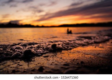 close up wave at sunset 