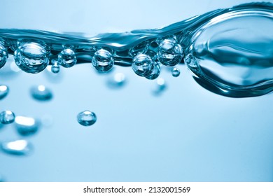 close up waves and bubbles on the water surface. 