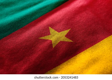 Close up waving flag of Cameroon. Concept of Cameroon.