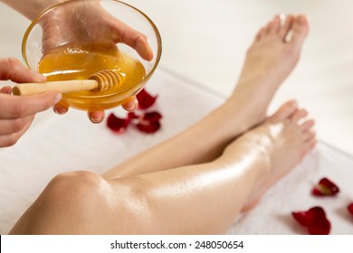 Close Up Waxing In By A Beautician In A Spa Center