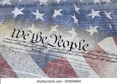 Close up of We the People of the Constitution of the United States of America and the Declaration of Independence with shallow depth of field