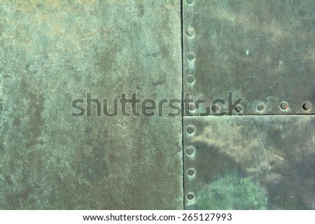close up of weathered copper sheet at a historic old door at the Cathedral of Magdeburg