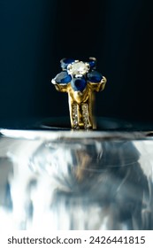 close up wedding ring, finger ring typically worn on the base of the left ring finger, usually forged from metal,  gold or another precious metal. indicates that its wearer is married
