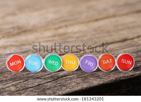 Close up weekly push pins