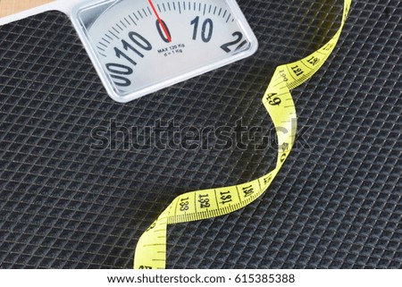 Close up weight scale and measuring tape, Diet concept.