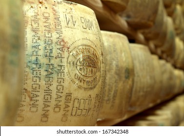 Close Up Of A Wheel Of Seasoned Parmesan Cheese