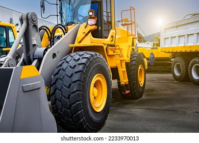 close up of wheel tractor loader. construction machinery heavy equipment. parked at the warehouse. - Shutterstock ID 2233970013