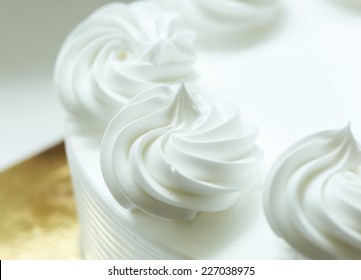 Close Up Of Whipping Cream Cake Decoration.