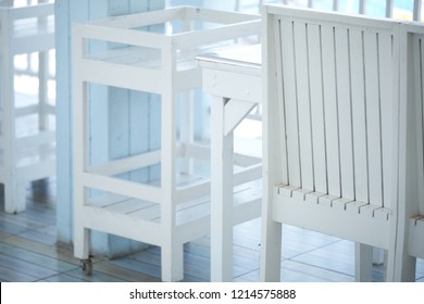 Close Up Of White Bar Cart Decor In Rustic Beach Style. Wheel Service Trolley For Drink & Alcohol Bottle. Bar Furniture For Home And Restaurant. Beverage Station For Guest To Put On Glass & Ice Basket